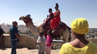 Erica-Campbell-Rides-A-Camel-2017-attachment